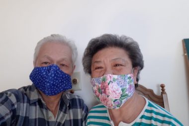Two ACCESS senior volunteers wearing handmade face masks